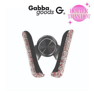 The Bling Hands-Free Car Vent Mount from Gabba Goods is a phone accessory featuring a central circular clip and two glitter-adorned arms. The top displays the Gabba Goods logo along with the phrase "Hotter Than Hot" in pink text with star accents, making it ideal for hands-free operation.