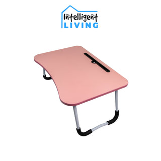 A pink, curved portable lap desk with white metal legs and black feet. The Intelligent Living Folding Laptop Workspace Table features a built-in groove for holding a tablet or phone. The "Intelligent Living" logo is displayed above the desk, perfect for your work-from-home setup.