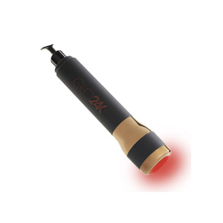 A "The Rejuvenator" Anti-Aging System by GLO24K, featuring a black and beige cylindrical design with a pump dispenser at the top and a glowing red LED light at the bottom, intended for Red LED Light Therapy. The product is presented against a white background.
